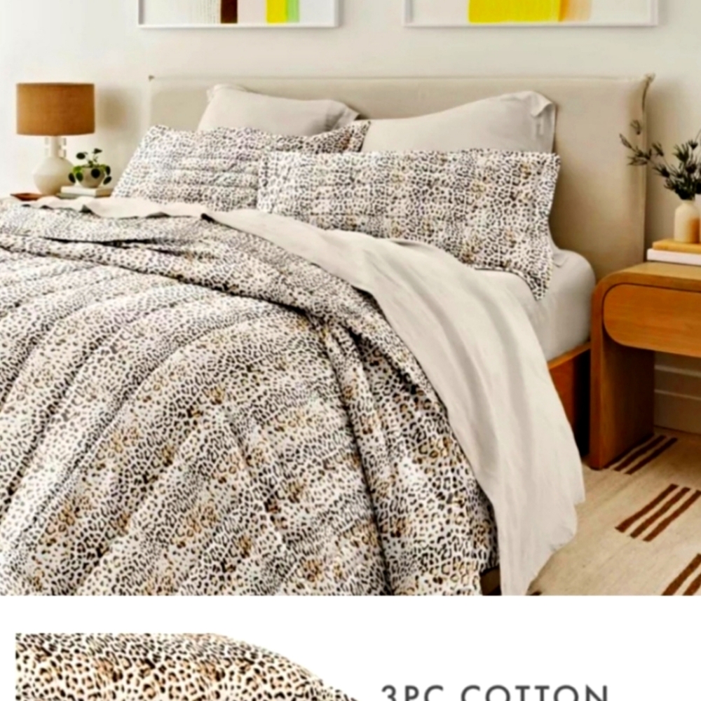 Rebecca Minkoff Queen quilt and shams. Sexy,comfortable, new with tags.